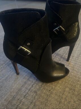 Luxury Rebel Black Peep-Toe Stiletto Ankle Boots with buckle and metallic sheen